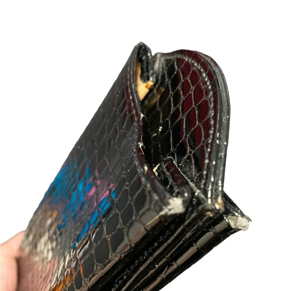 Double-sided black leather eyeglasses case. Holds 2 pairs of glasses. Used
